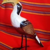 Hand carved and painted wooden bird